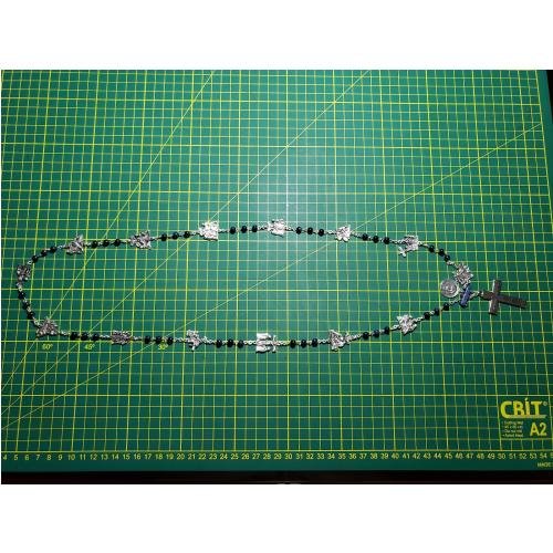 Vía Crucis de metal plateado con medallas detalladas